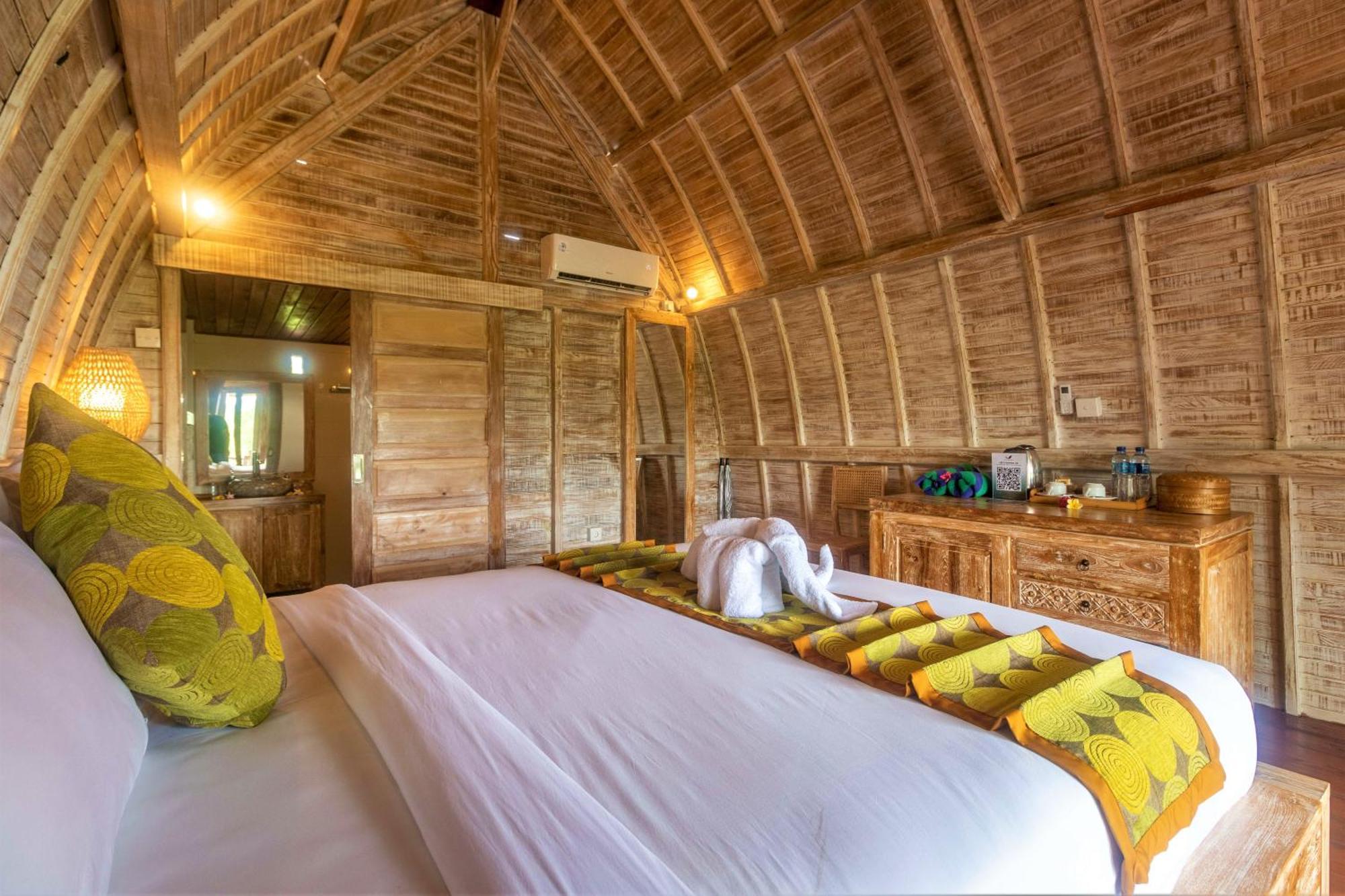 Alamgangga Villas Tirta Gangga Каранґасем Номер фото